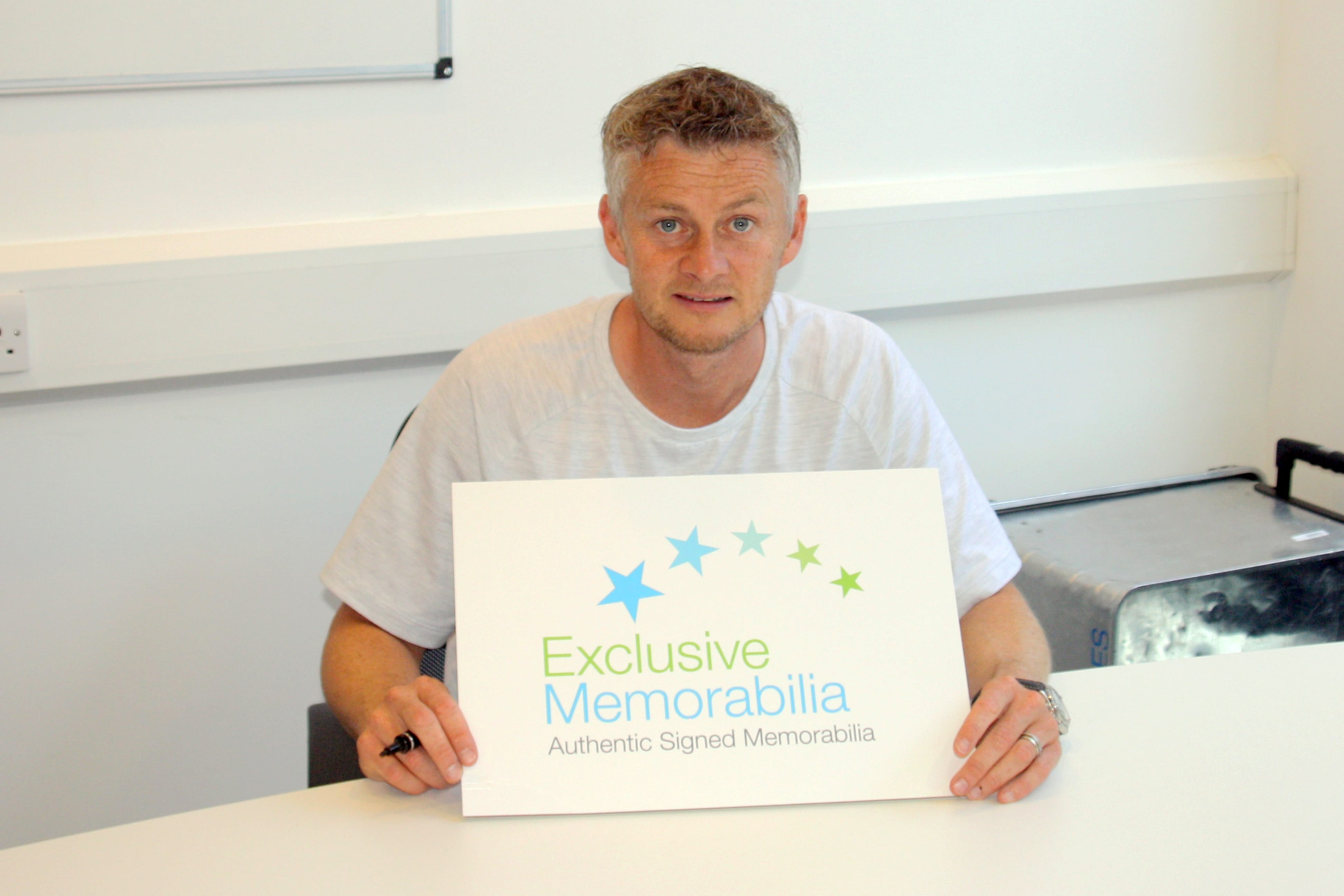 Ole Gunnar Solskjaer signing for Exclusive Memorabilia